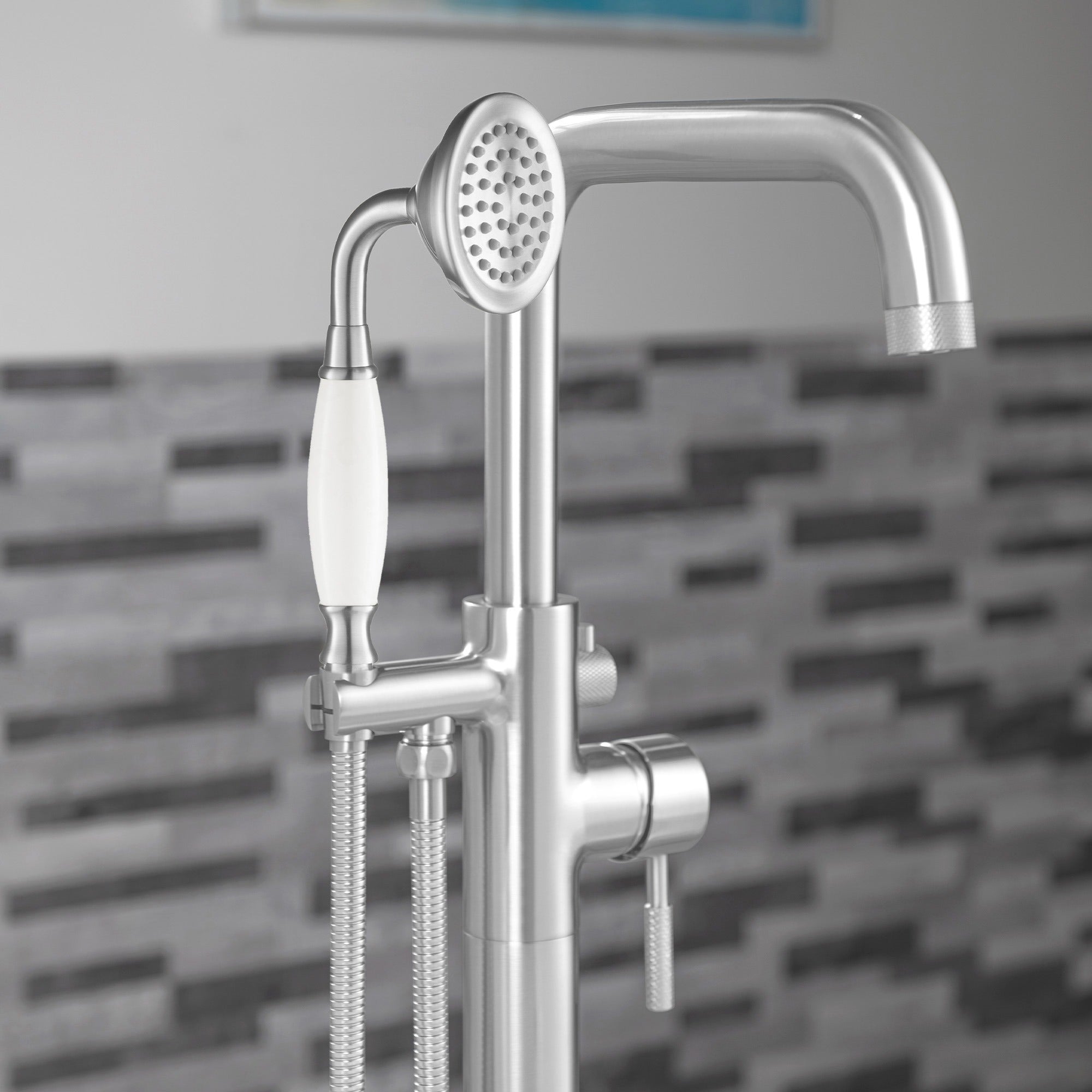 WOODBRIDGE Fusion Single Handle Floor Mount Freestanding Tub Filler Faucet with Classic Telephone Style Hand Shower