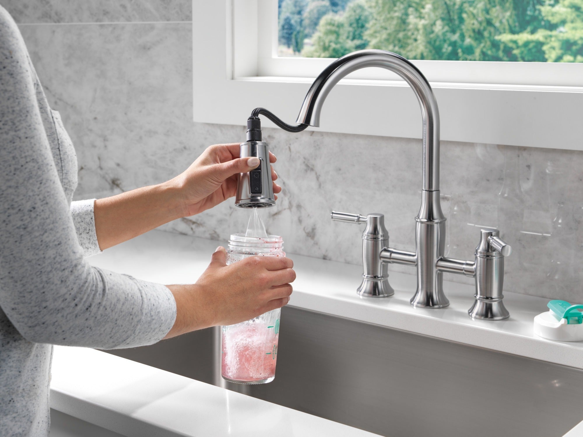 Delta Renaldi™ Two Handle Pull-Down Bridge Kitchen Faucet