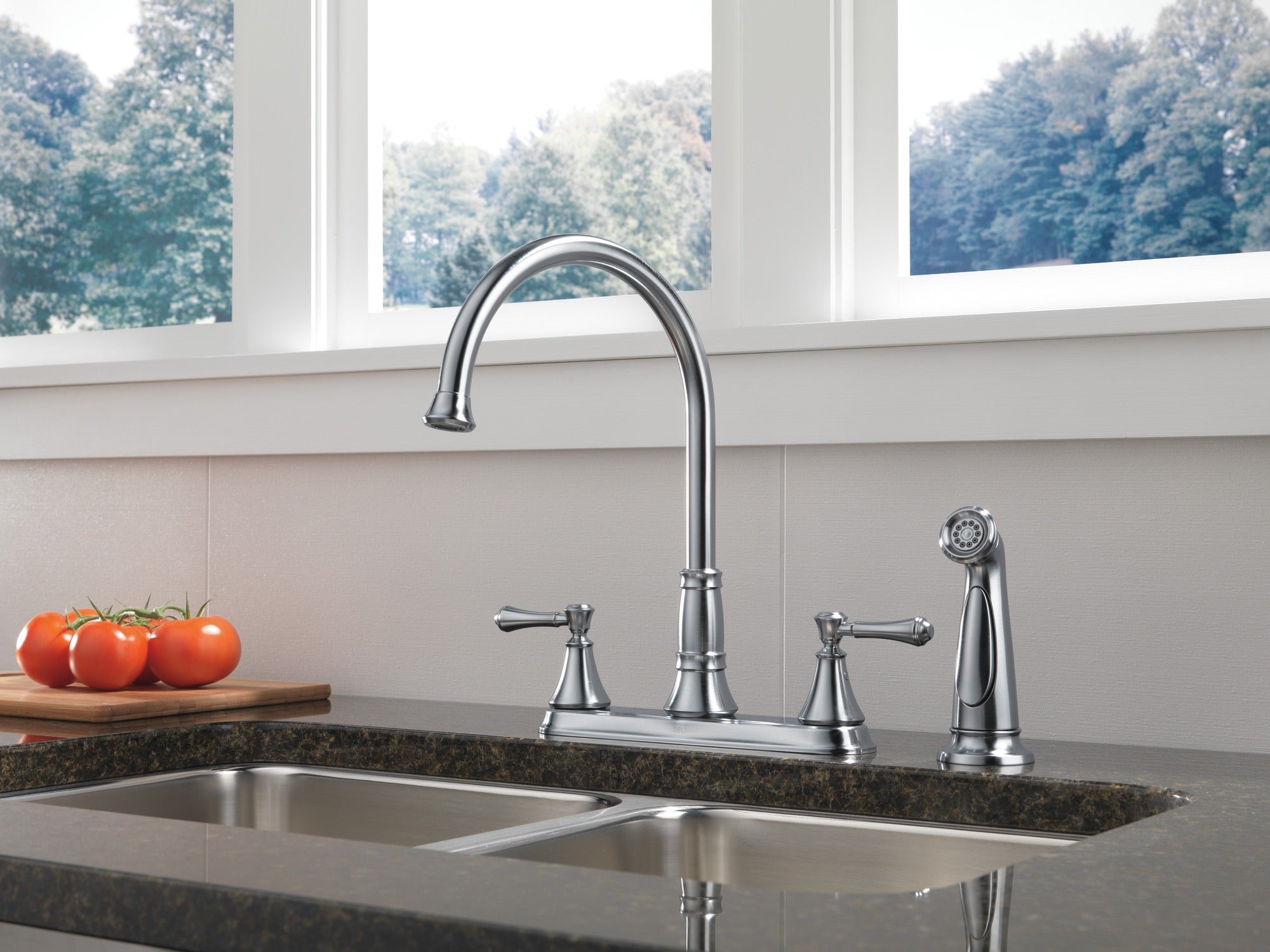 Delta Cassidy® Two Handle Kitchen Faucet with Spray