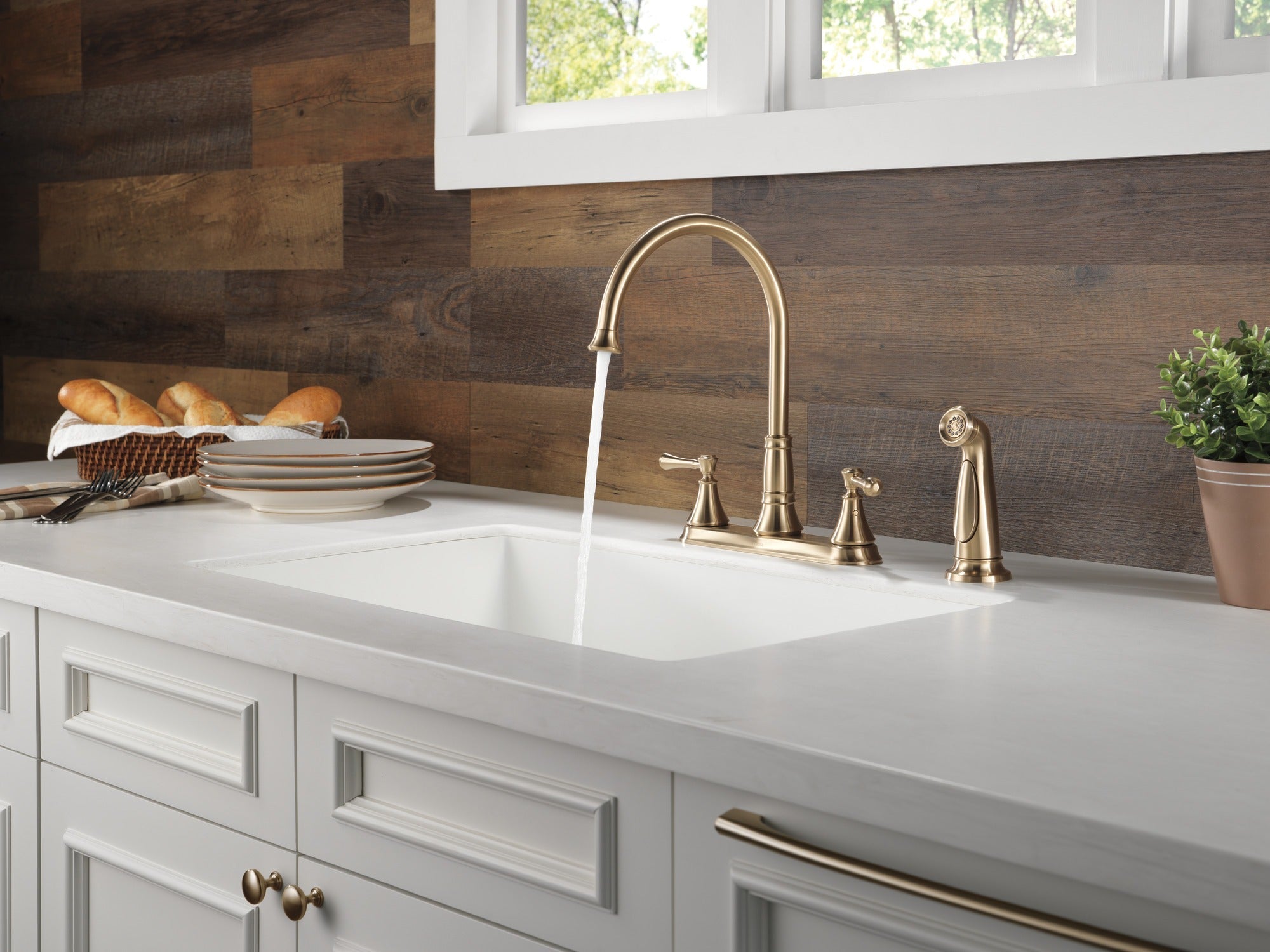 Delta Cassidy® Two Handle Kitchen Faucet with Spray