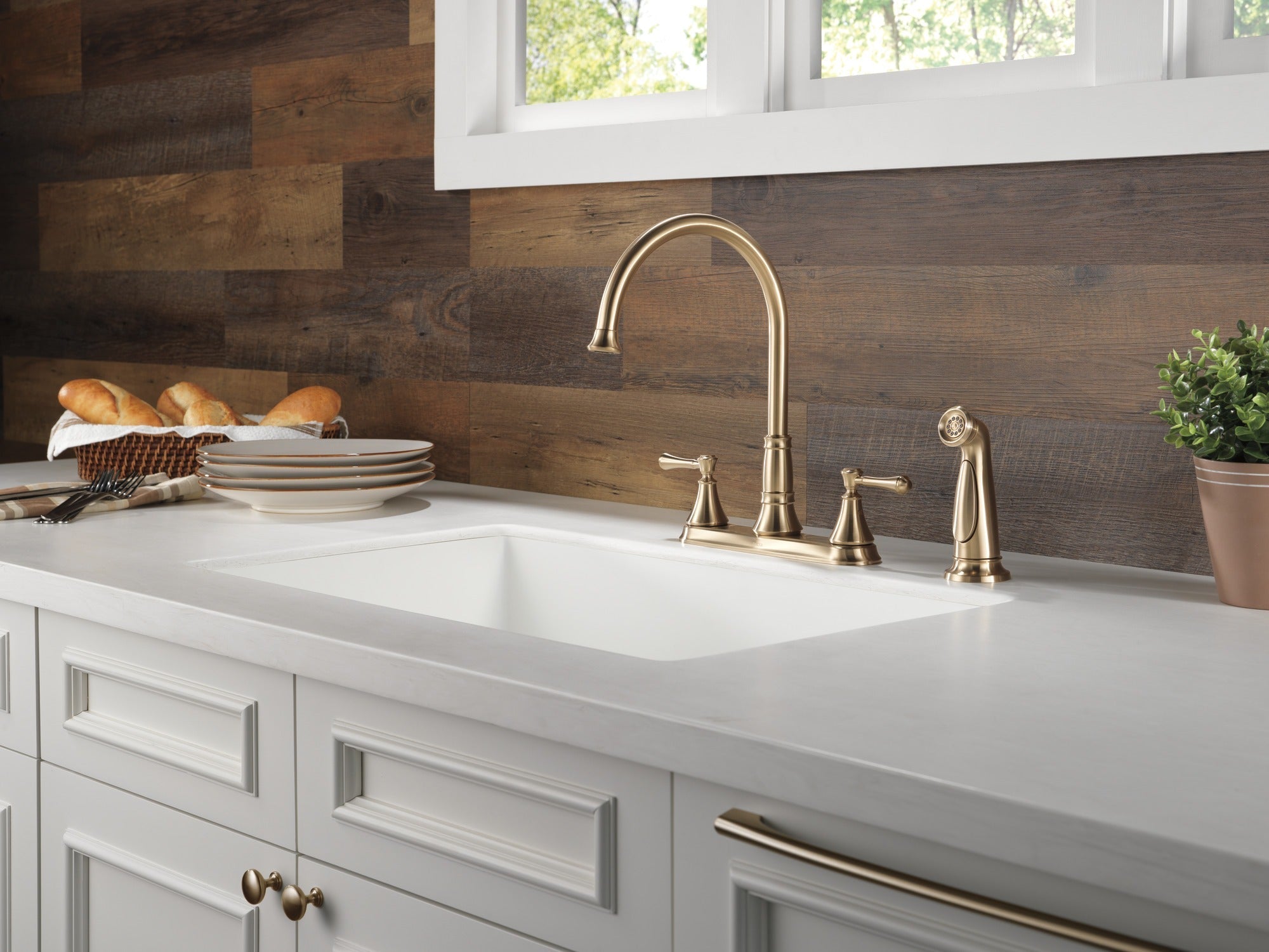 Delta Cassidy® Two Handle Kitchen Faucet with Spray