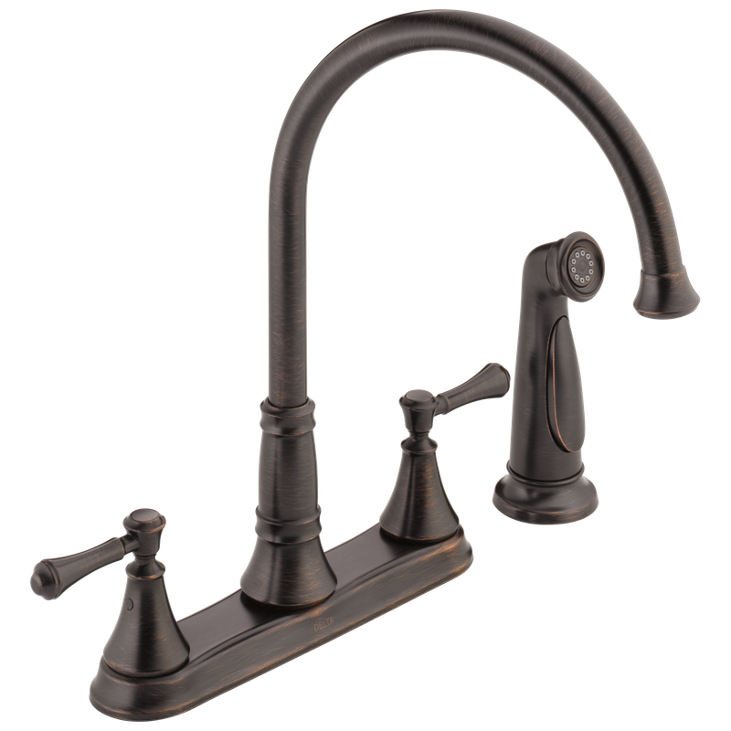 Delta Cassidy® Two Handle Kitchen Faucet with Spray