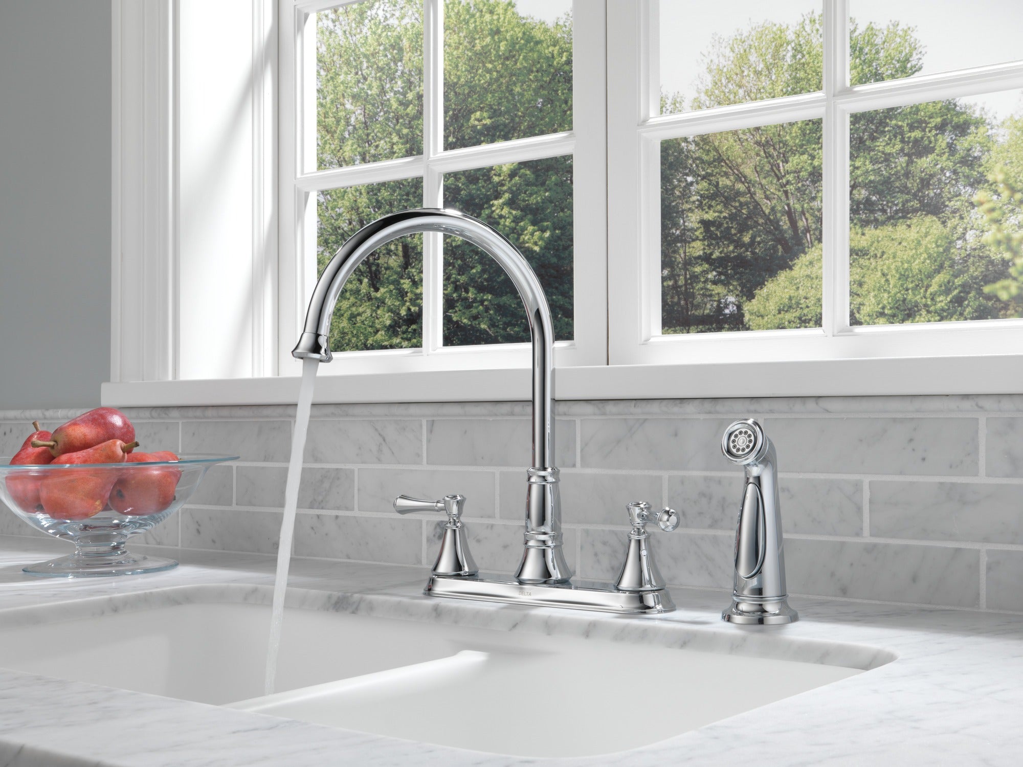 Delta Cassidy® Two Handle Kitchen Faucet with Spray