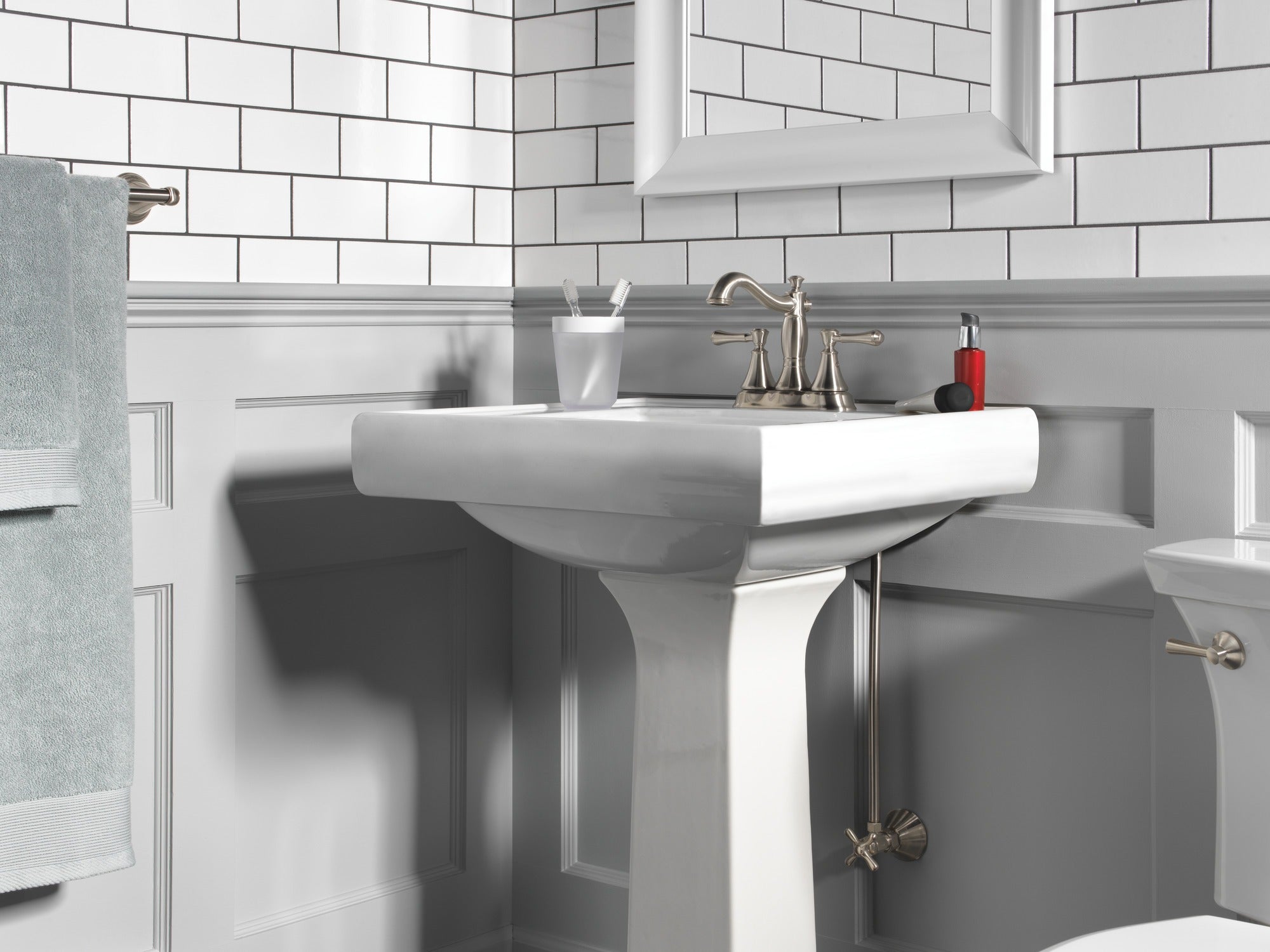 Delta Cassidy® Two Handle Centerset Bathroom Faucet - Metal Pop-Up