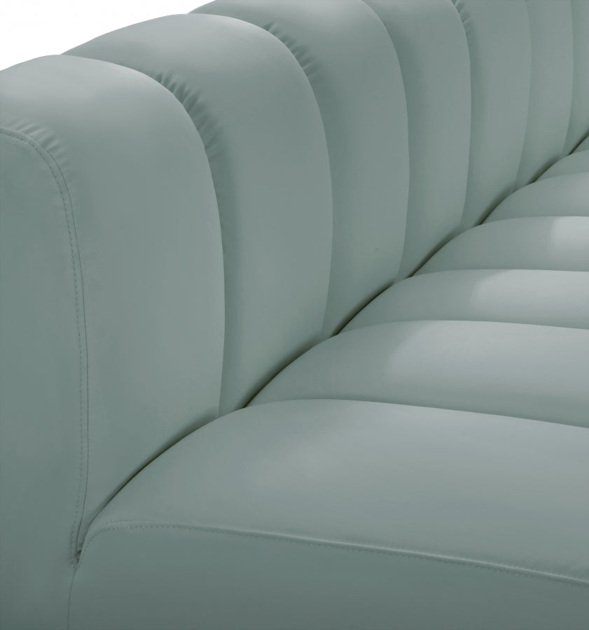 Arc 104" Vegan Leather Upholstered 4pc. Modular Sectional