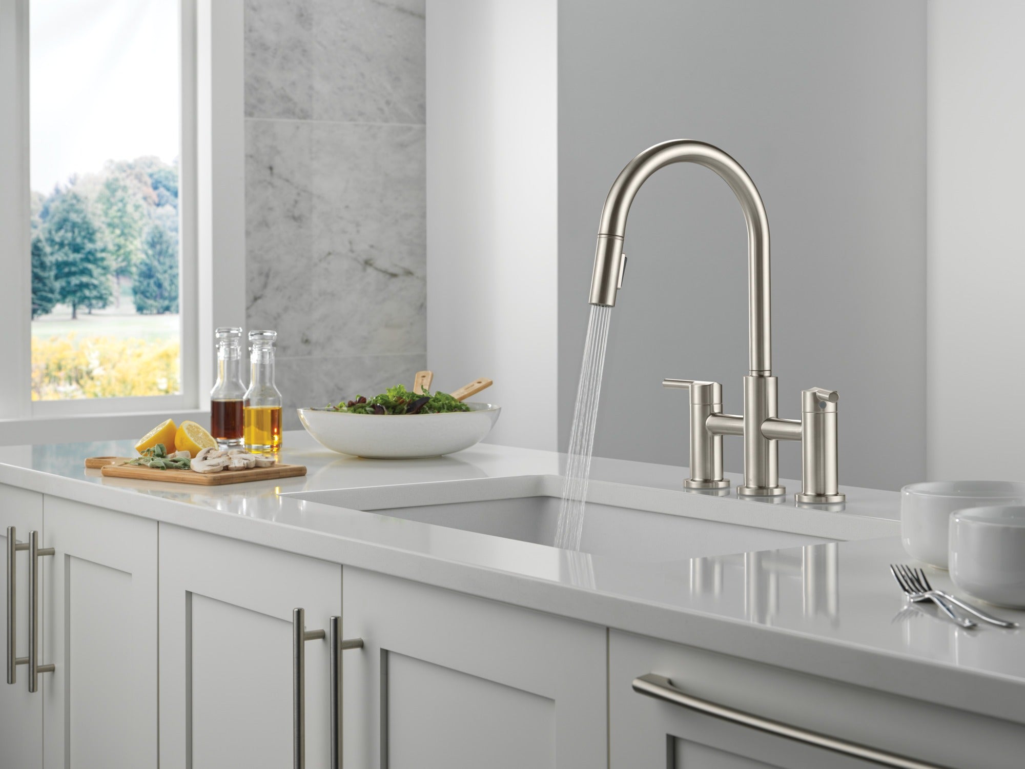 Delta Nicoli® Two Handle Pull-Down Bridge Kitchen Faucet