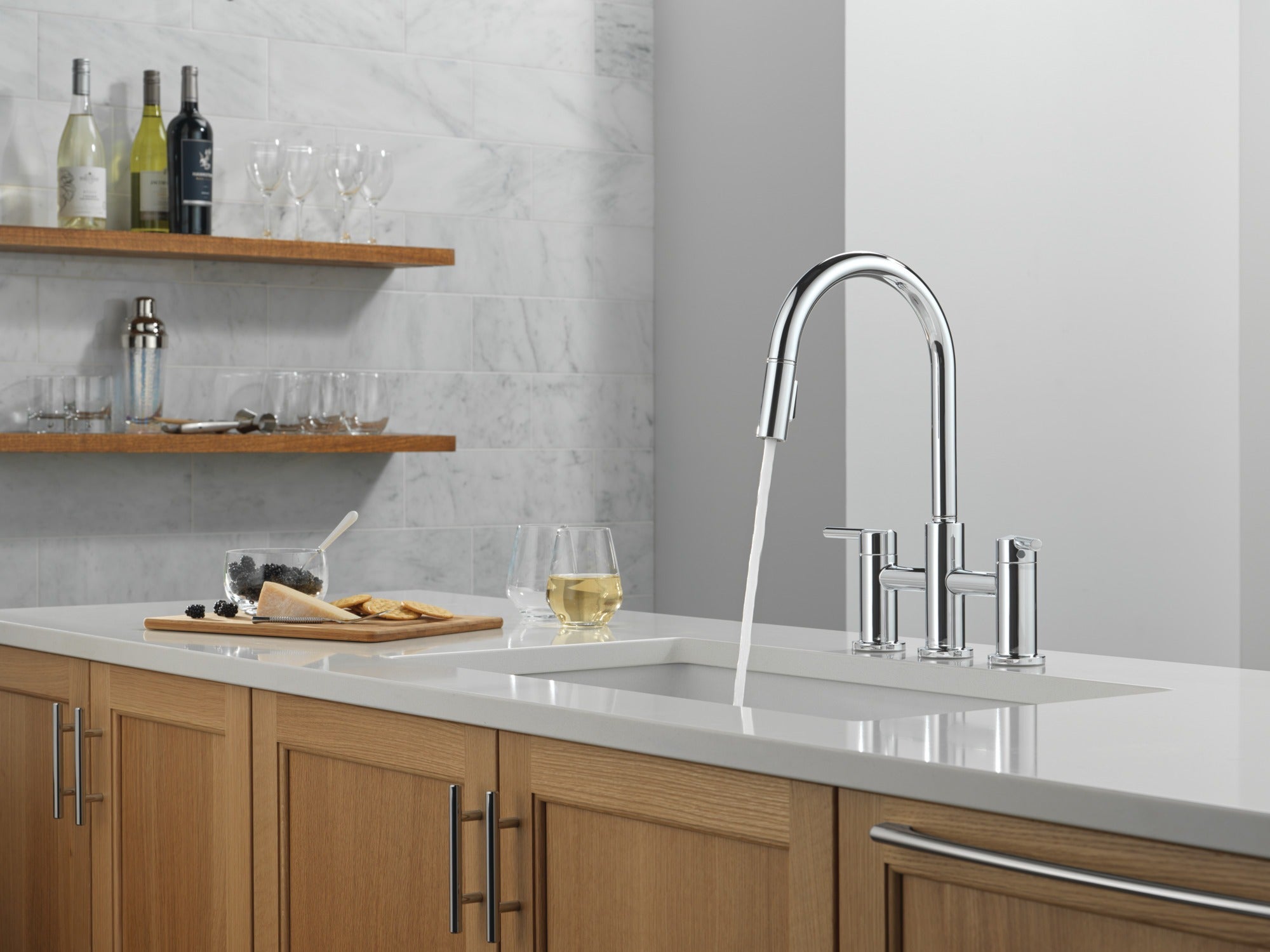 Delta Nicoli® Two Handle Pull-Down Bridge Kitchen Faucet