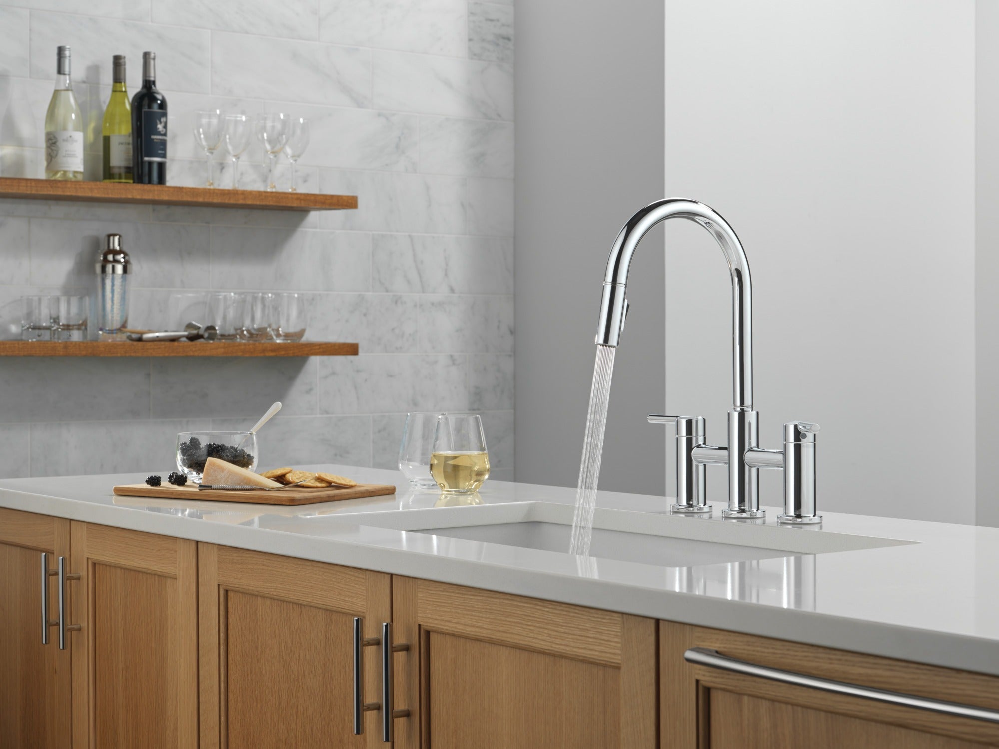 Delta Nicoli® Two Handle Pull-Down Bridge Kitchen Faucet