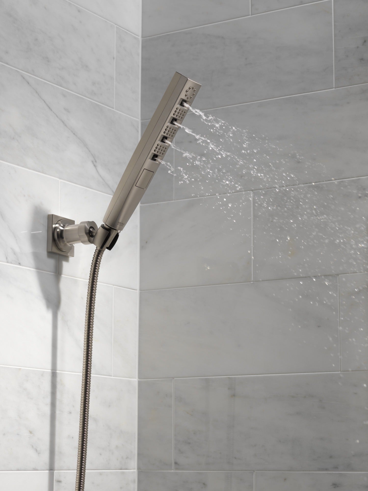 Delta Universal Showering Components H2OKinetic® 4-Setting Wall Mount Hand Shower