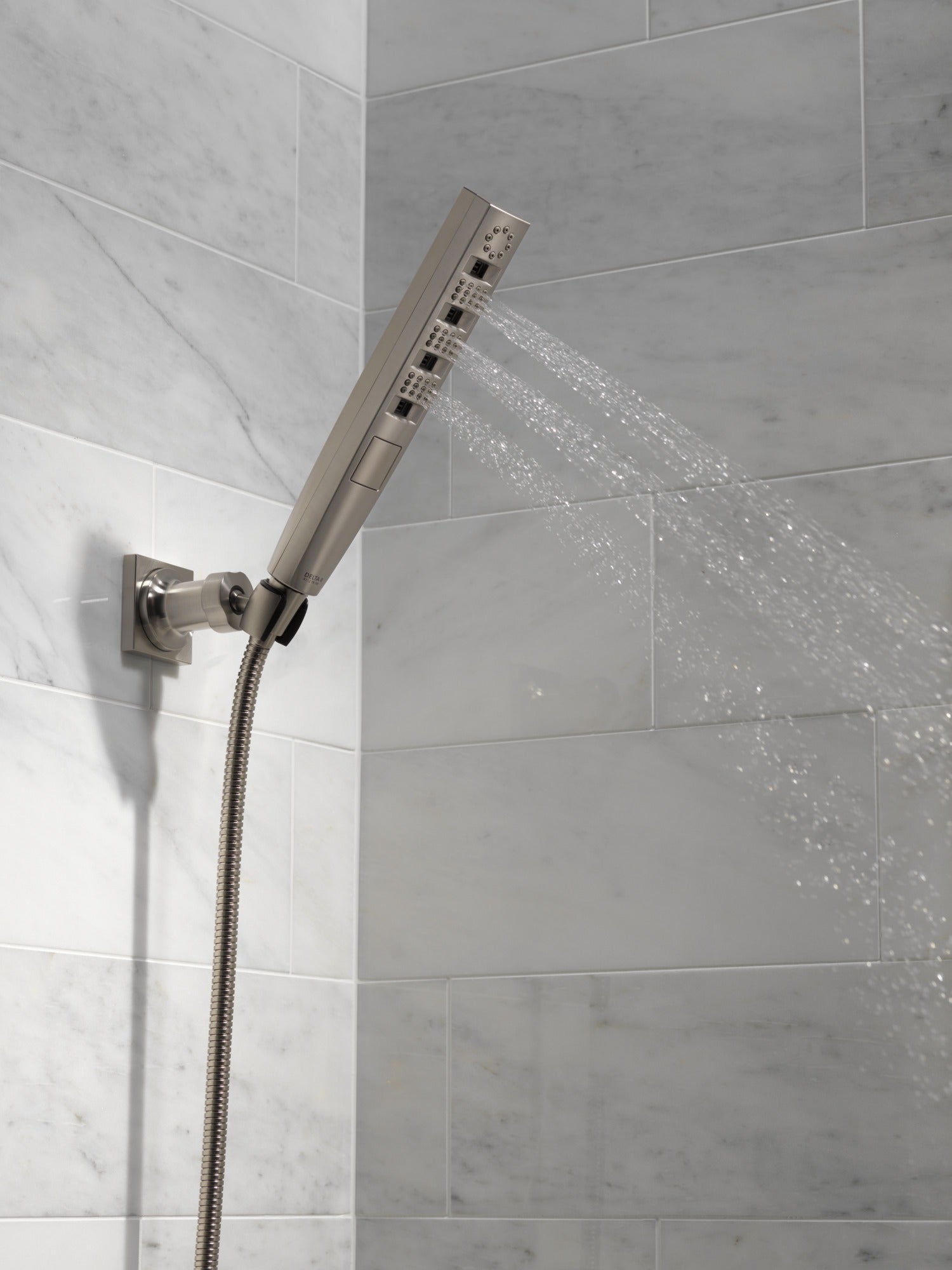 Delta Universal Showering Components H2OKinetic® 4-Setting Wall Mount Hand Shower