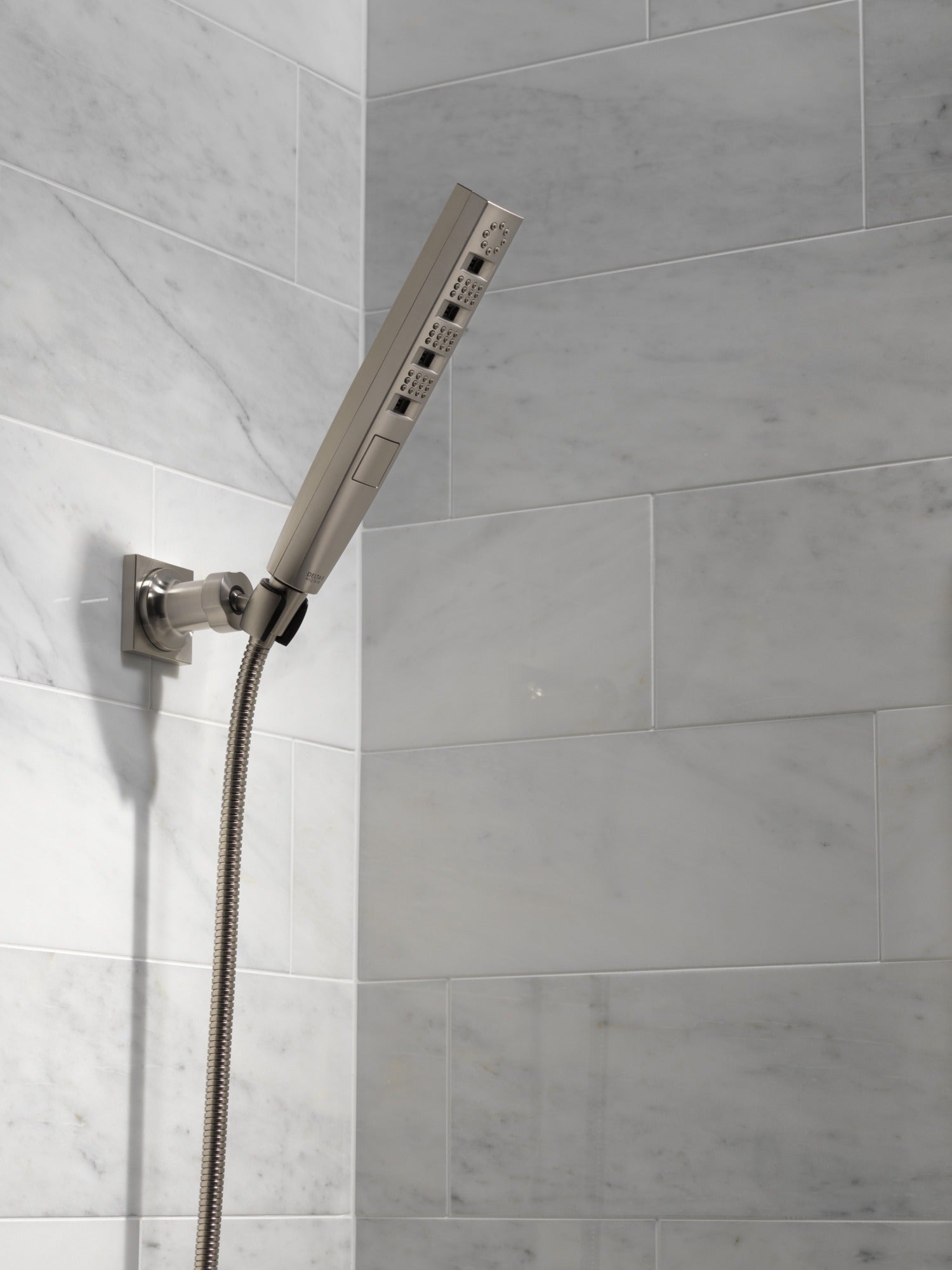 Delta Universal Showering Components H2OKinetic® 4-Setting Wall Mount Hand Shower