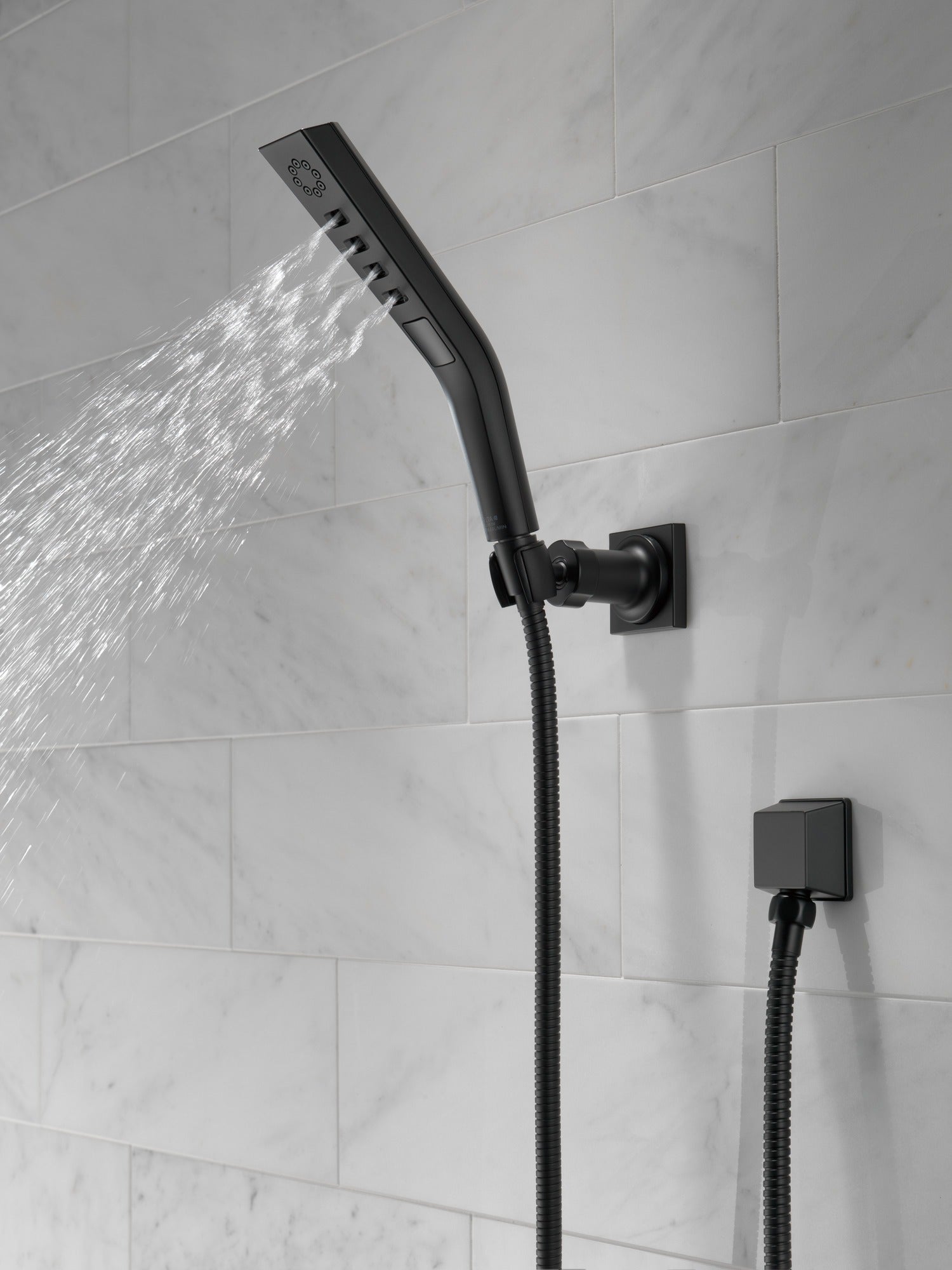 Delta Universal Showering Components H2OKinetic® 3-Setting Wall Mount Hand Shower