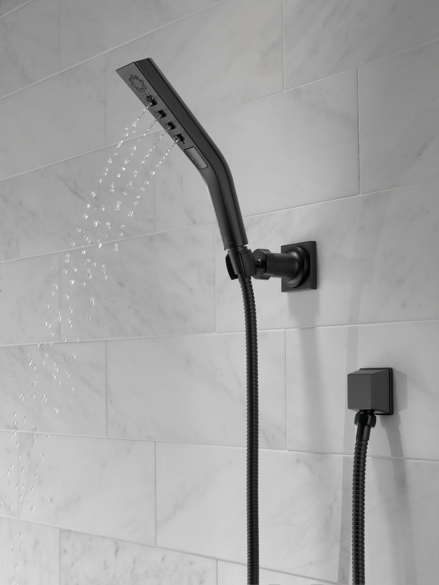 Delta Universal Showering Components H2OKinetic® 3-Setting Wall Mount Hand Shower