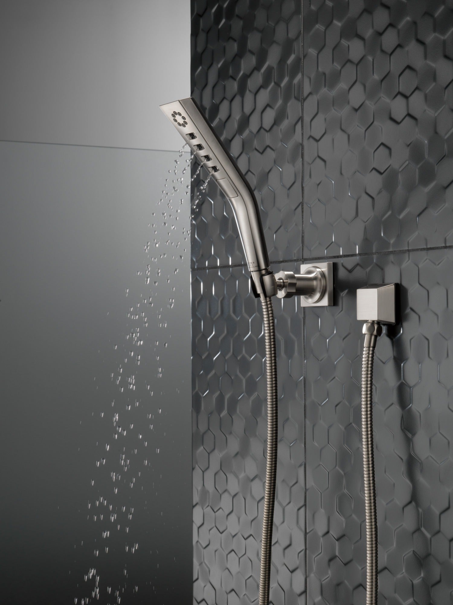 Delta Universal Showering Components H2OKinetic® 3-Setting Wall Mount Hand Shower
