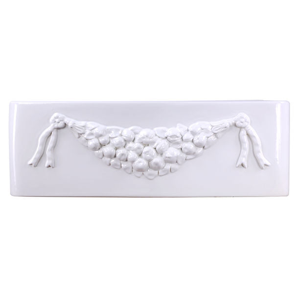 Farmhouse Fireclay Apron Sink with an embossed decorative design