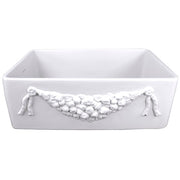 Farmhouse Fireclay Apron Sink with an embossed decorative design