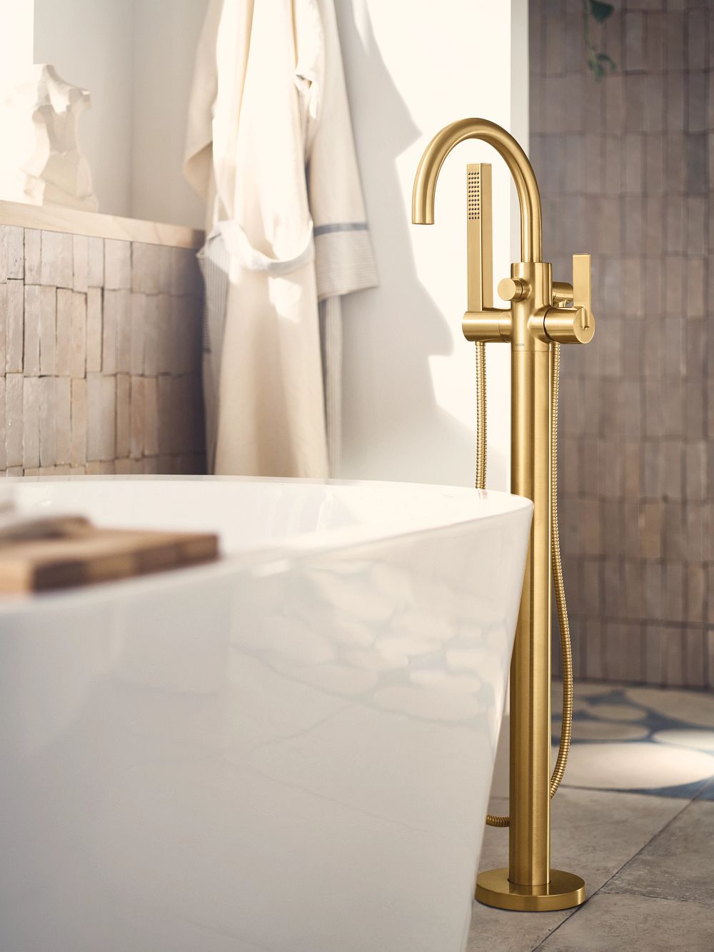 Cia one-handle tub filler includes hand shower
