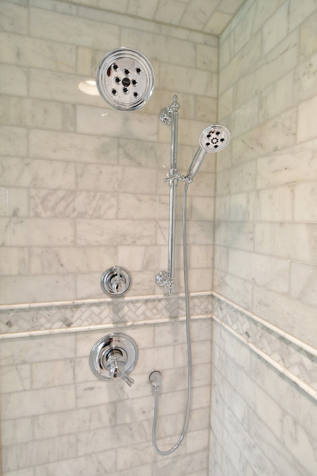 Brizo Essential™ Shower 7" Classic Round H<sub>2</sub>Okinetic<sup>®</sup> Single Function Wall Mount Showerhead