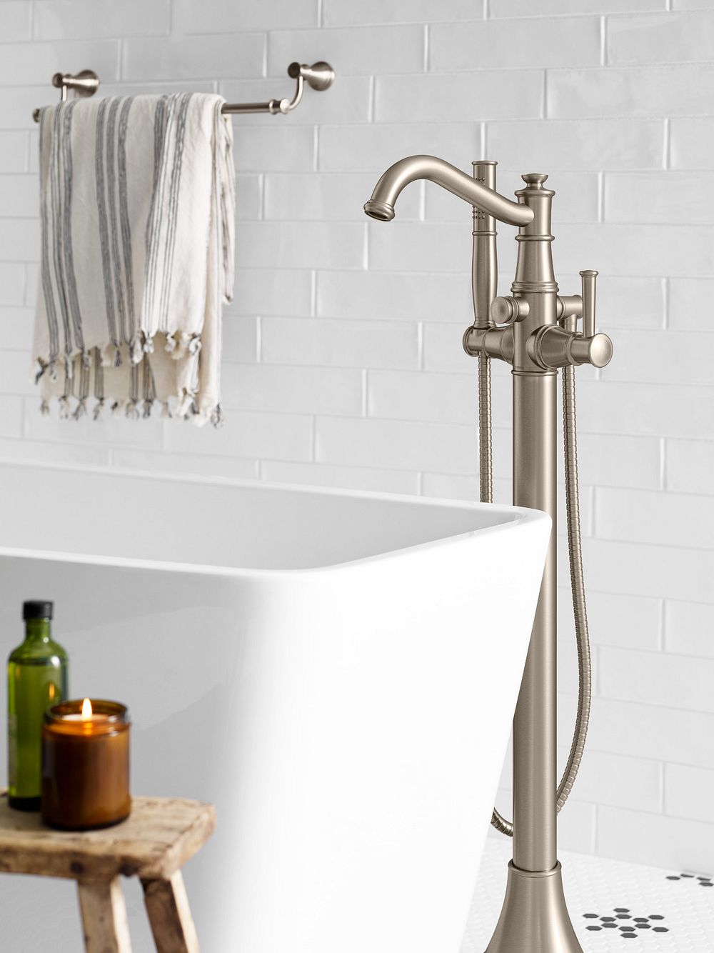 Belfield one-handle tub filler includes hand shower