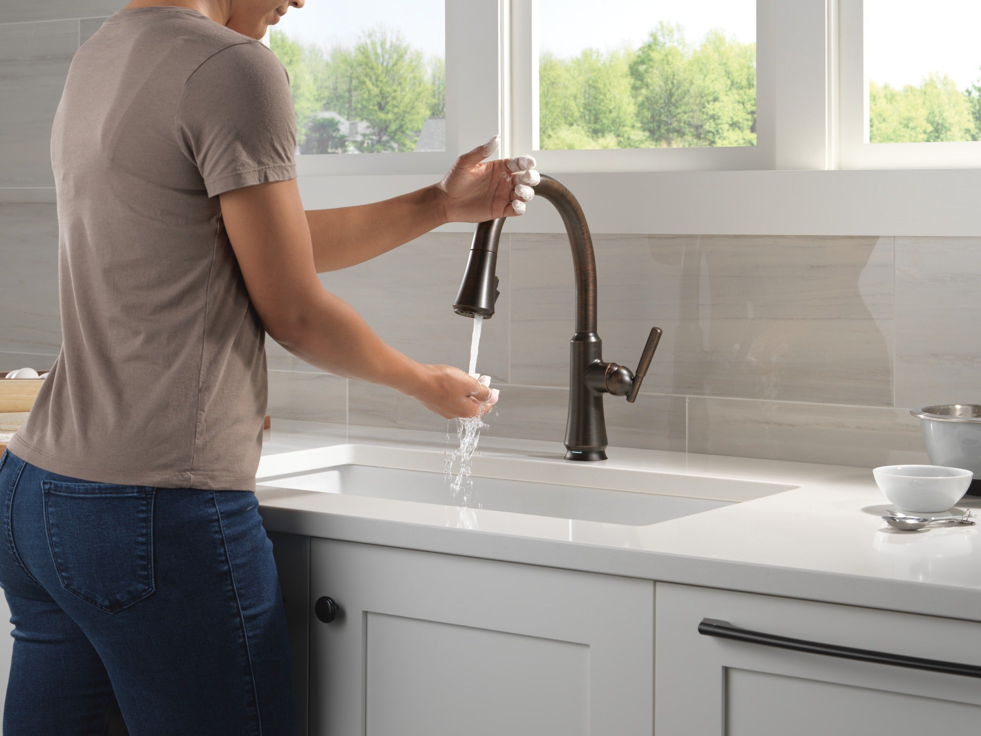 Delta Coranto® Touch<sub>2</sub>O® Technology Kitchen Faucet with Touchless Technology