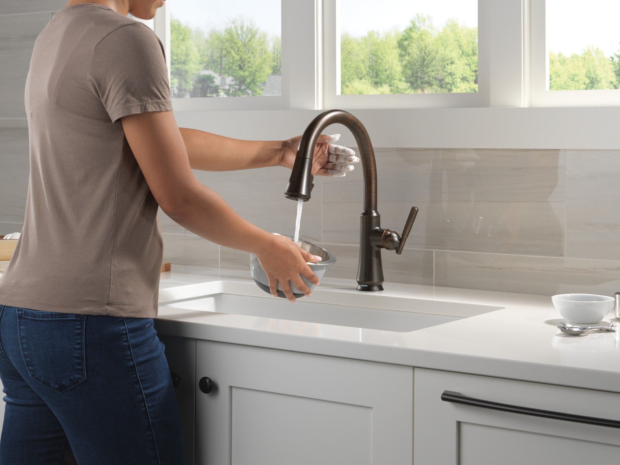 Delta Coranto® Touch<sub>2</sub>O® Technology Kitchen Faucet with Touchless Technology