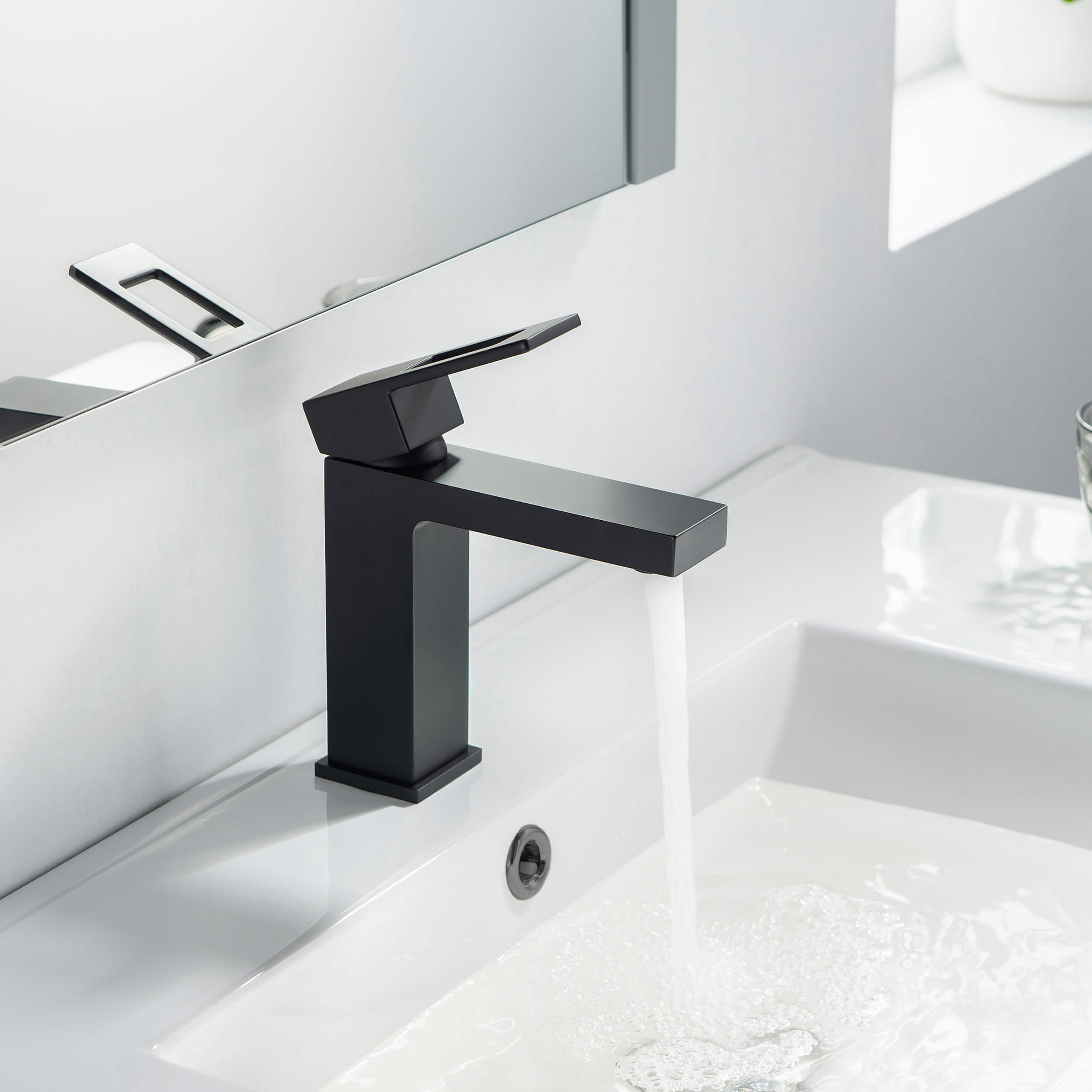 Quadra Single Handle Bathroom Vanity Sink Faucet with Pop Up Drain