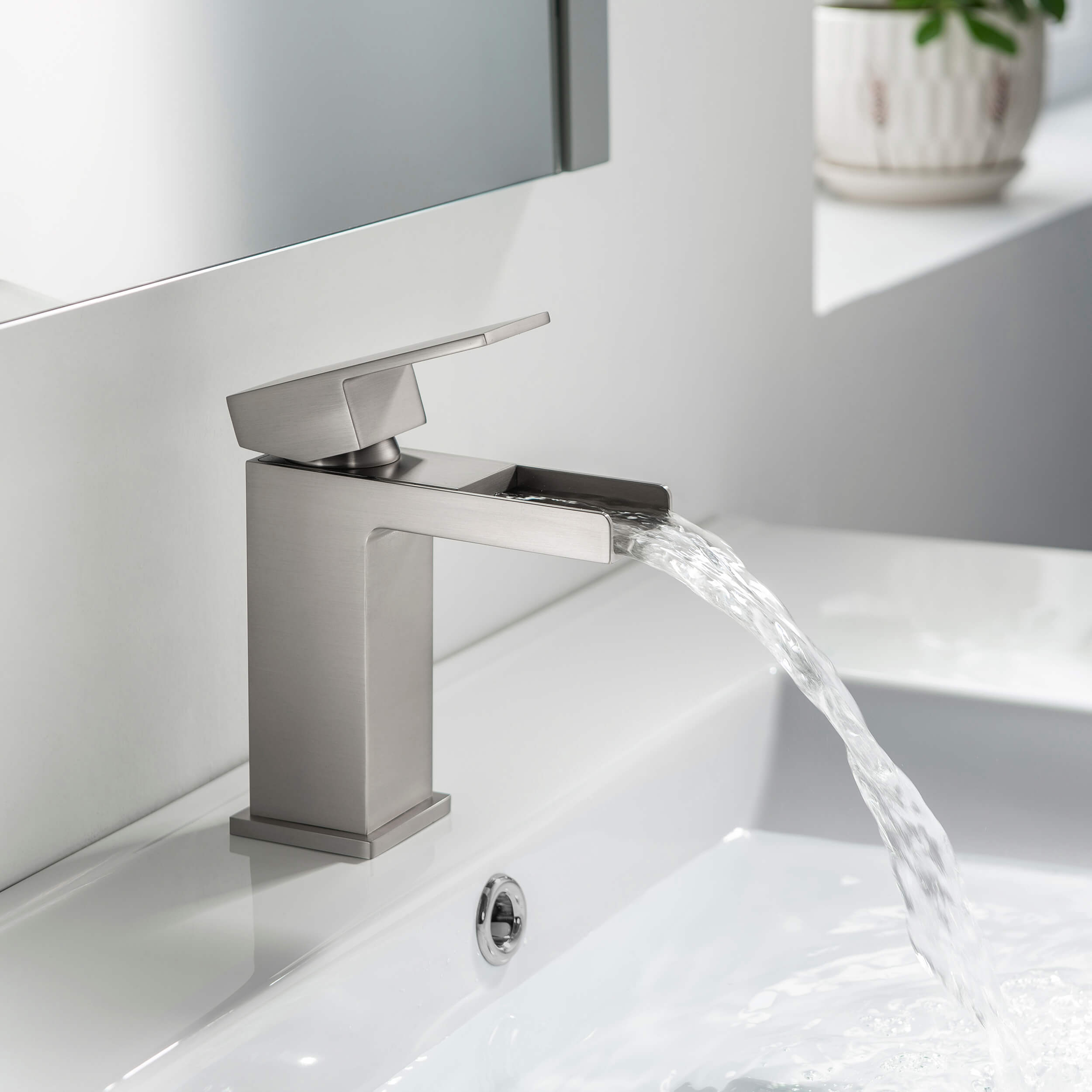 Quadra Waterfall Single Handle Bathroom Vanity Sink Faucet with Pop Up Drain