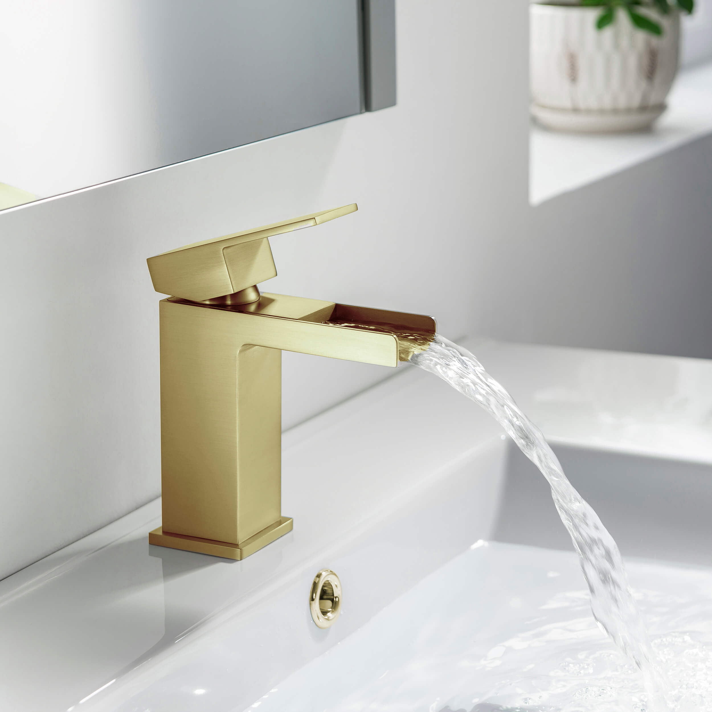 Quadra Waterfall Single Handle Bathroom Vanity Sink Faucet with Pop Up Drain