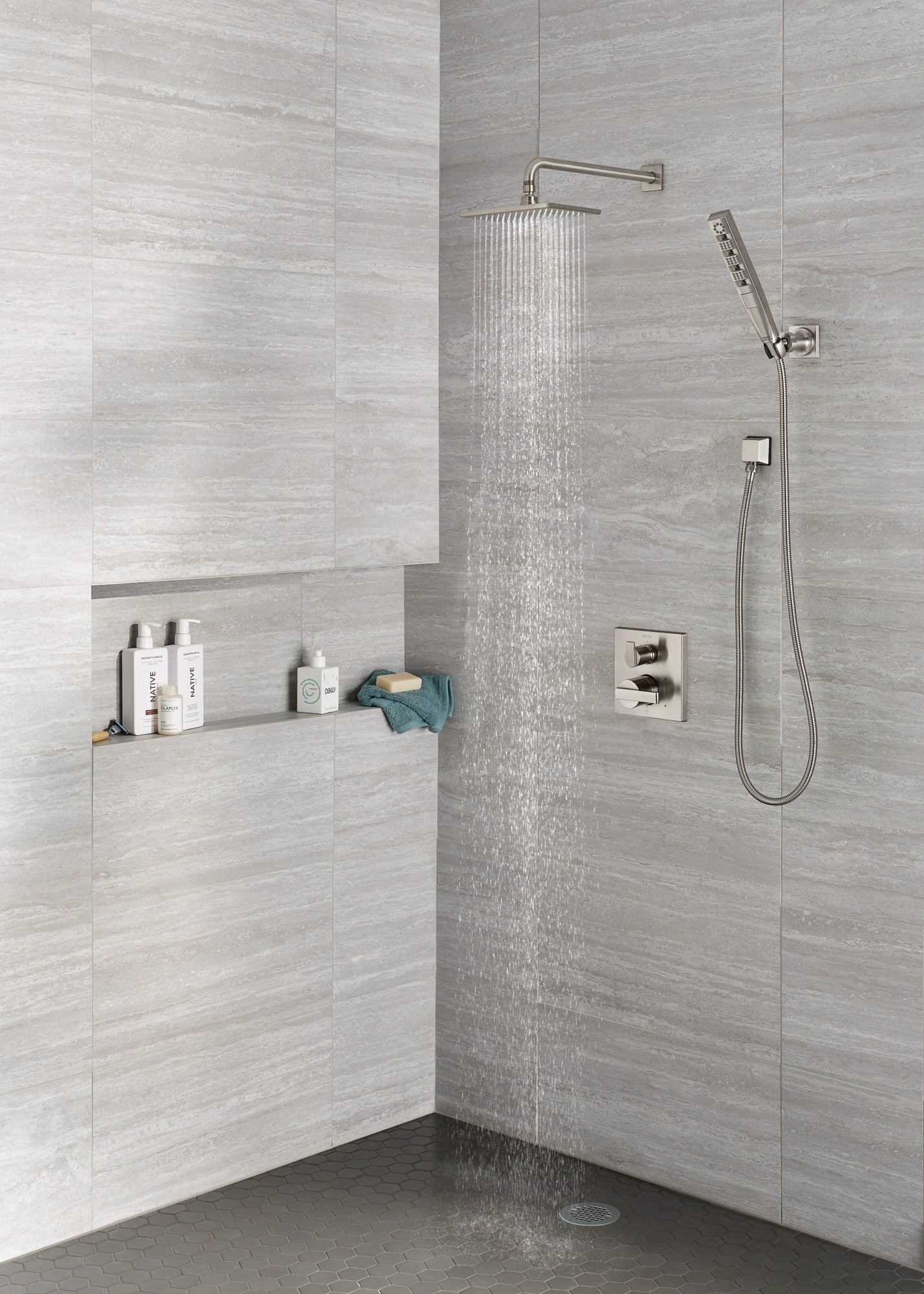 Delta Universal Showering Components H2OKinetic® 4-Setting Wall Mount Hand Shower