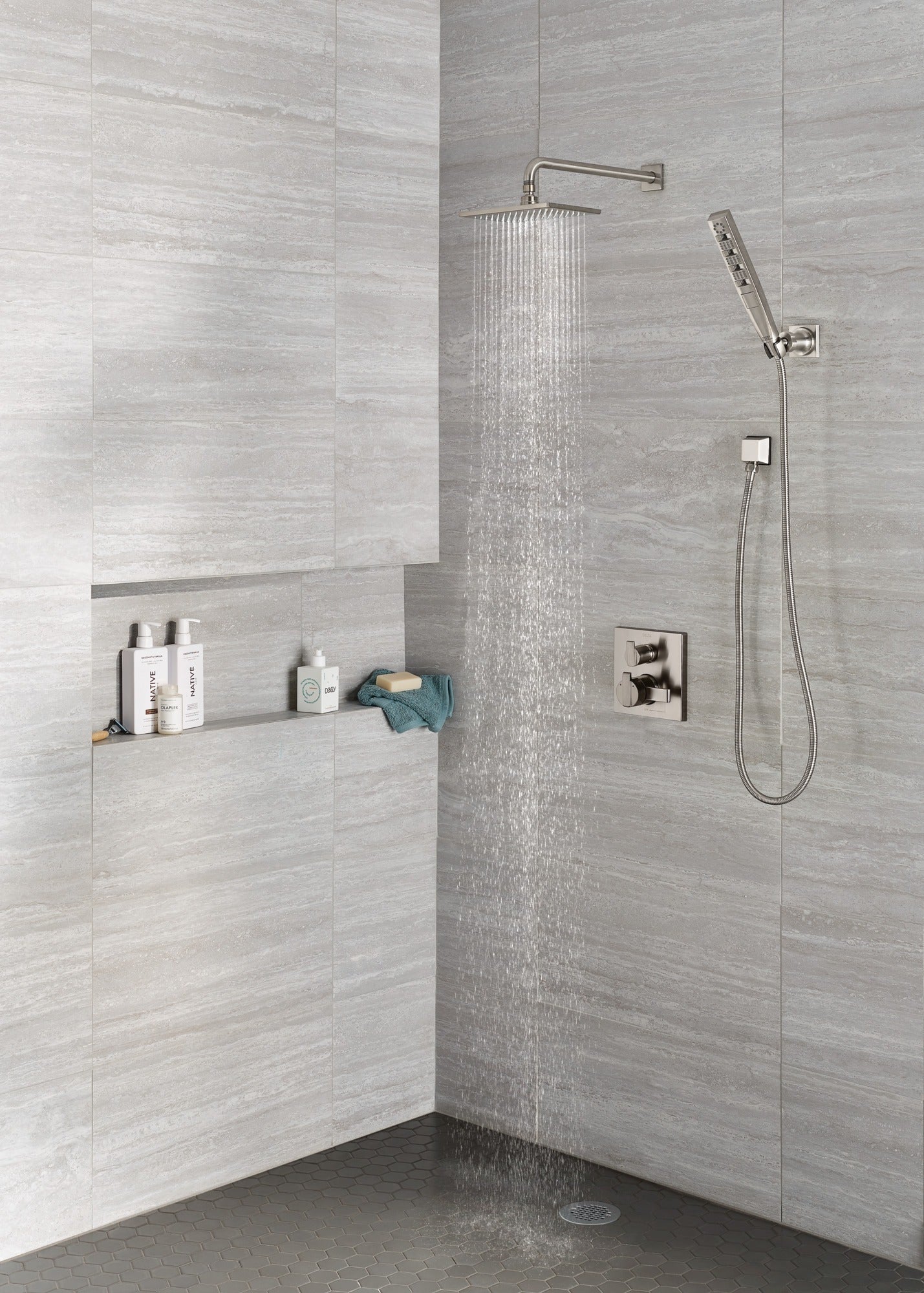 Delta Universal Showering Components H2OKinetic® 4-Setting Wall Mount Hand Shower