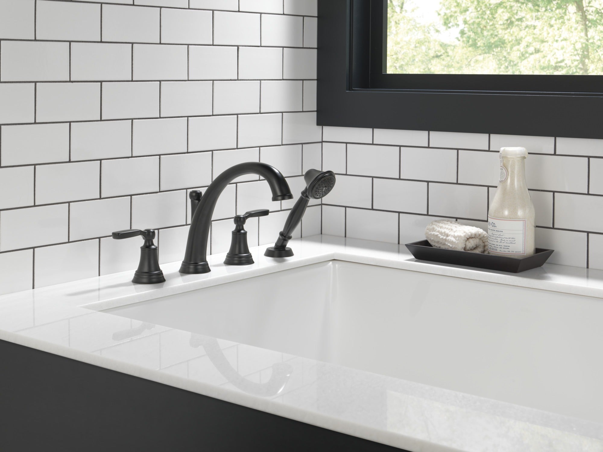 Delta Woodhurst™ Roman Tub with Hand Shower Trim