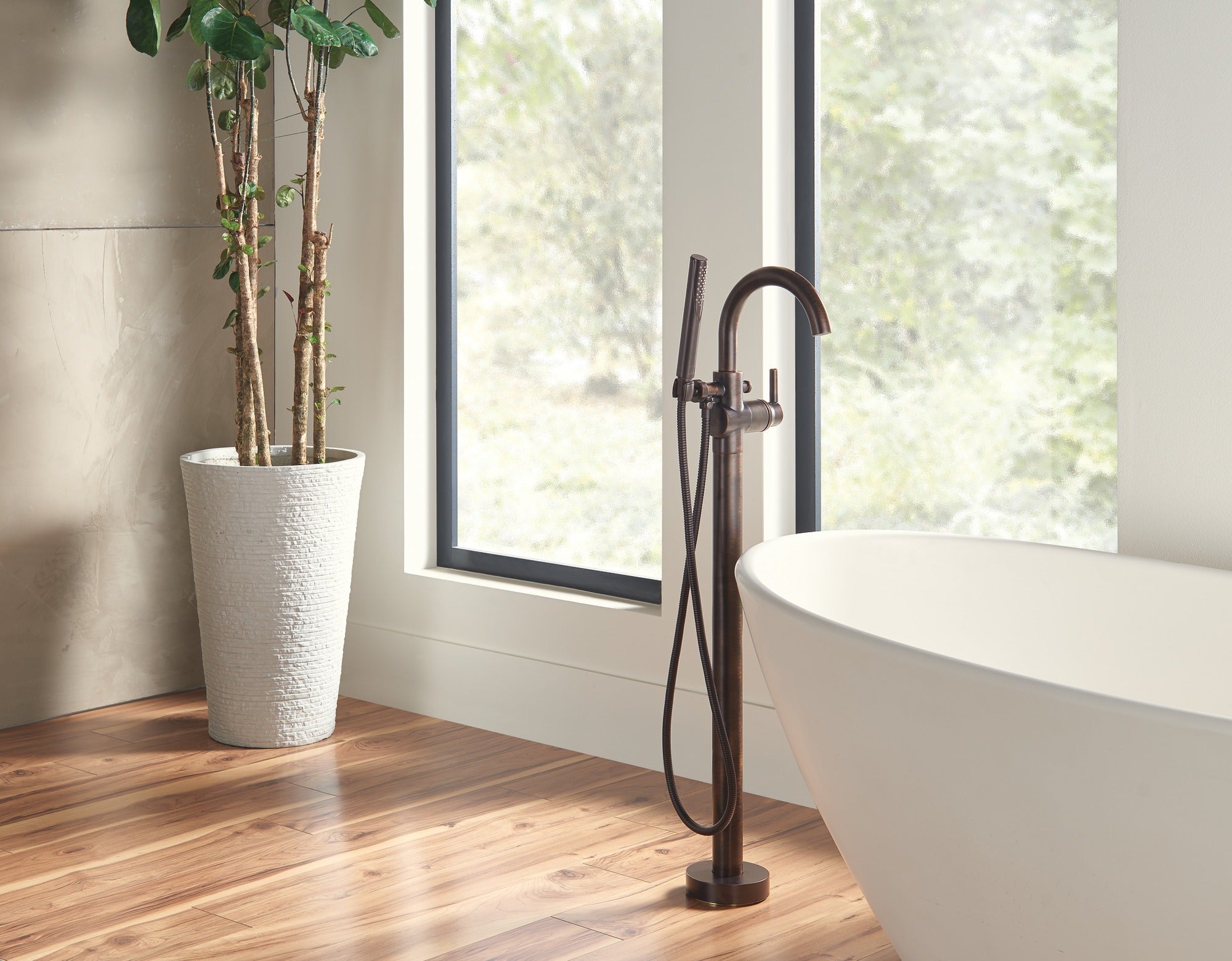 Delta Trinsic® Single Handle Floor Mount Tub Filler Trim with Hand Shower