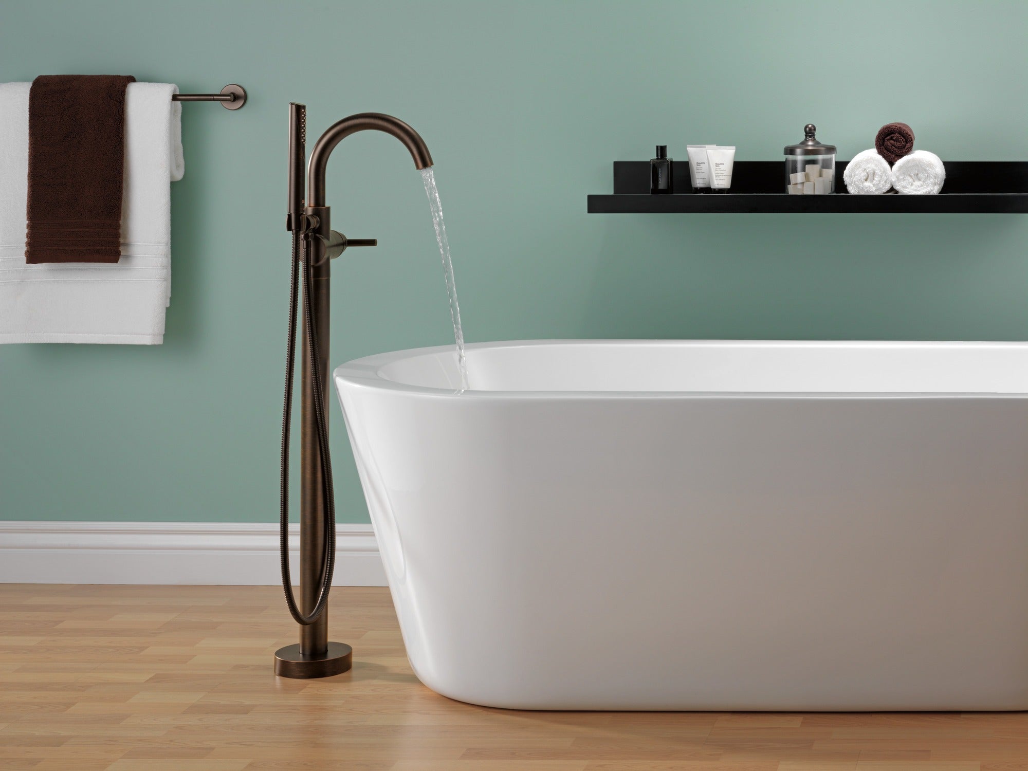 Delta Trinsic® Single Handle Floor Mount Tub Filler Trim with Hand Shower