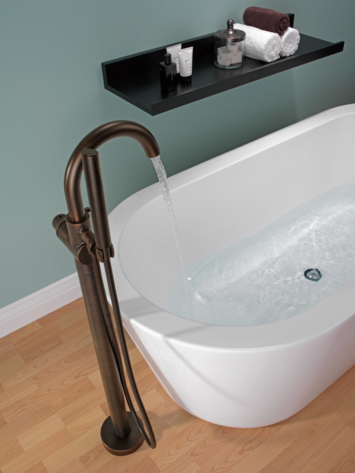 Delta Trinsic® Single Handle Floor Mount Tub Filler Trim with Hand Shower