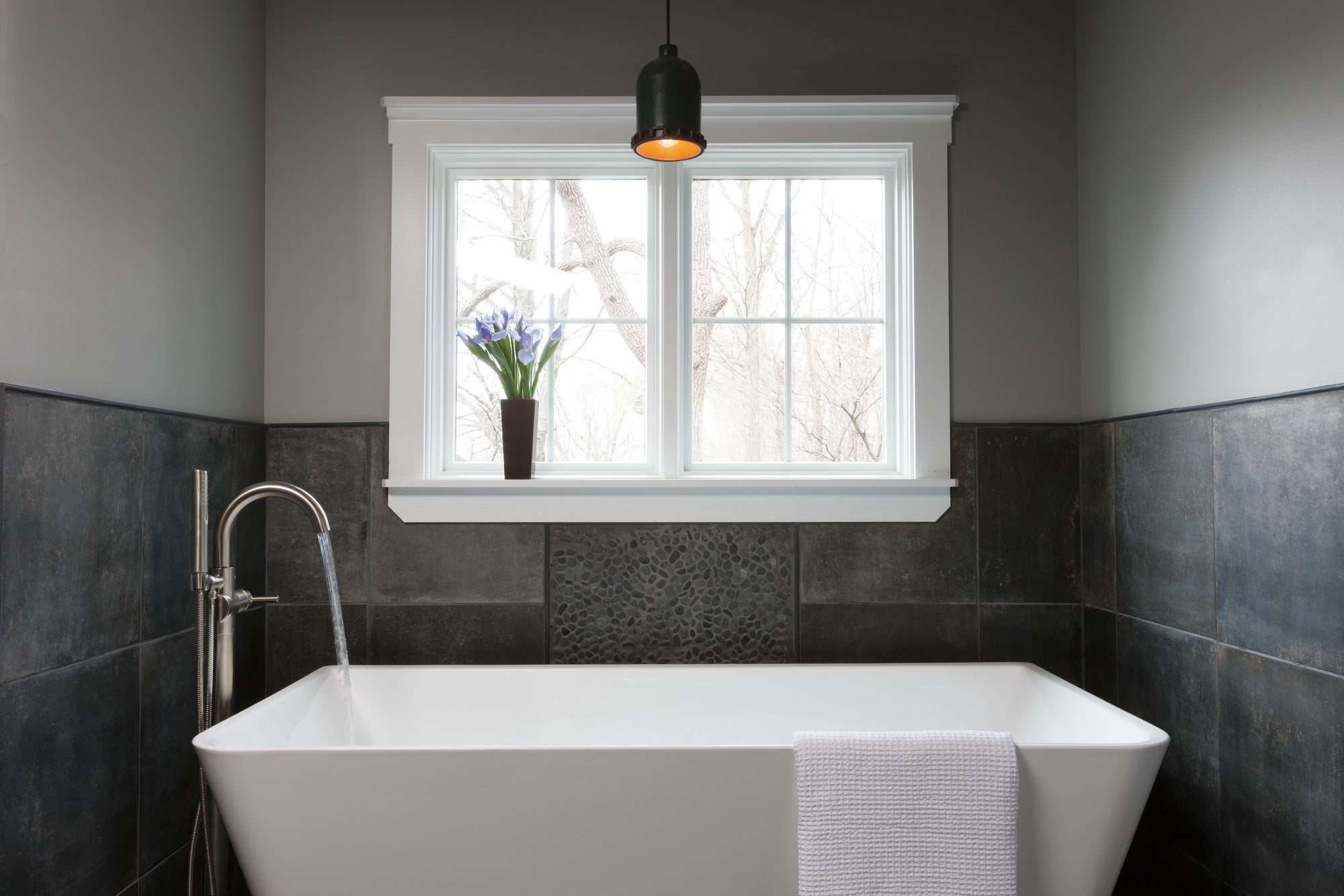 Delta Trinsic® Single Handle Floor Mount Tub Filler Trim with Hand Shower