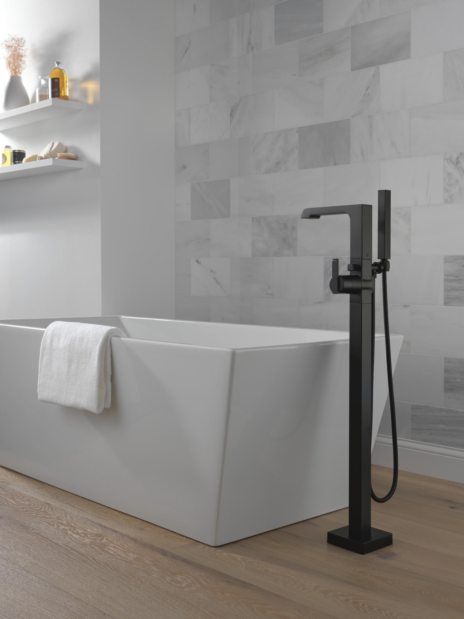 Delta Ara® Single Handle Floor Mount Tub Filler Trim with Hand Shower