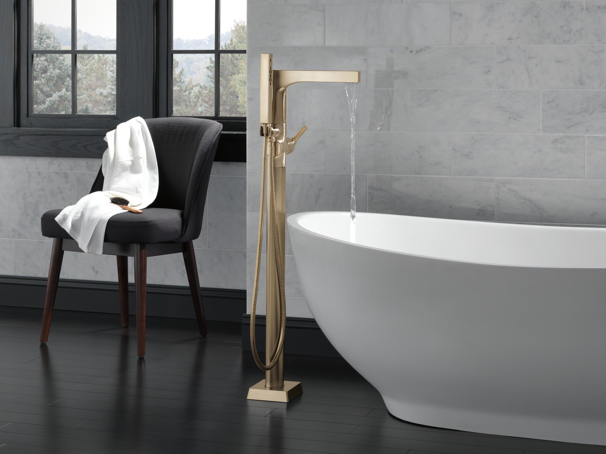 Delta Zura® Single Handle Floor Mount Tub Filler Trim with Hand Shower