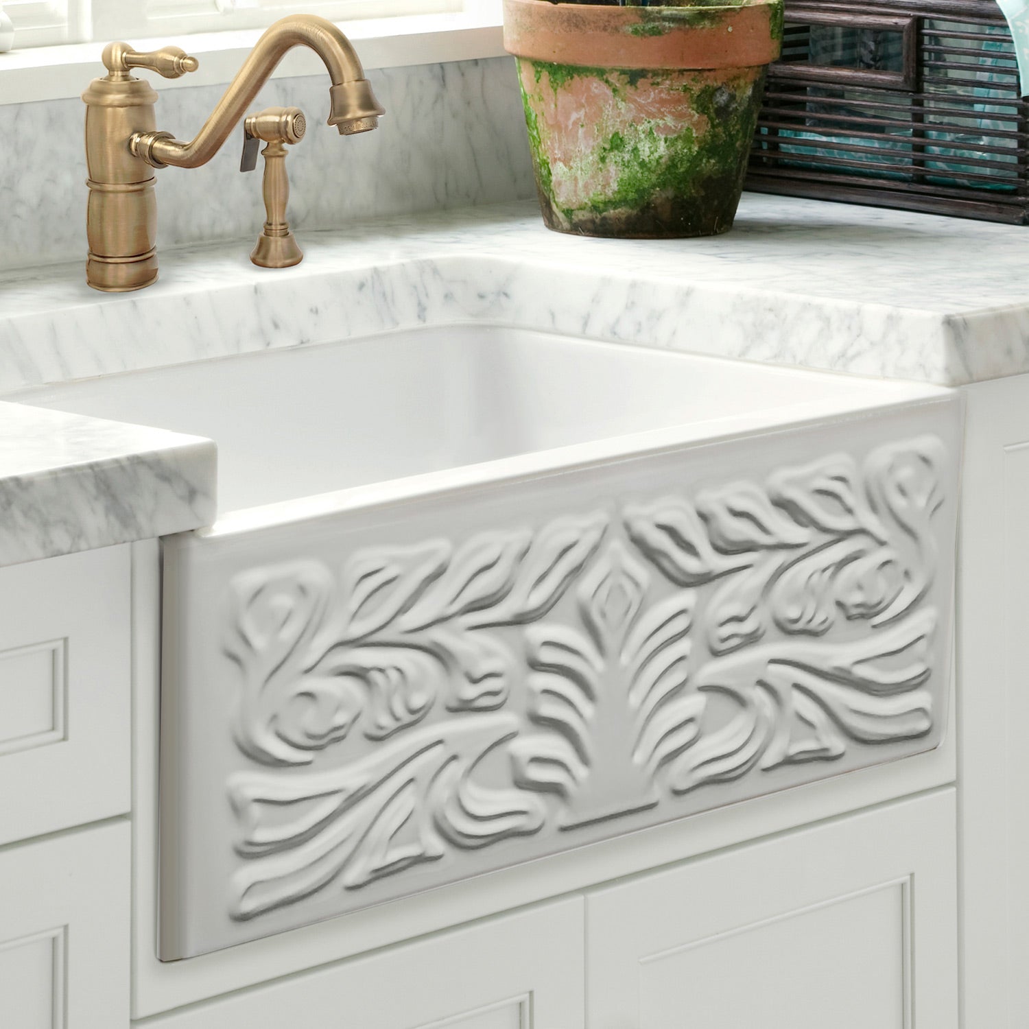 Farmhaus Fireclay Reversible Sink with a Gothichaus Swirl Design Front Apron on One Side, and a Fluted Front Apron on the Opposite Side.