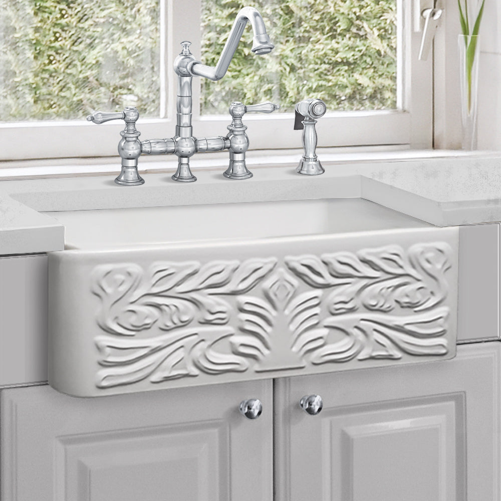 Farmhaus Fireclay Reversible Sink with a Gothichaus Swirl Design Front Apron on One Side, and a Fluted Front Apron on the Opposite Side.