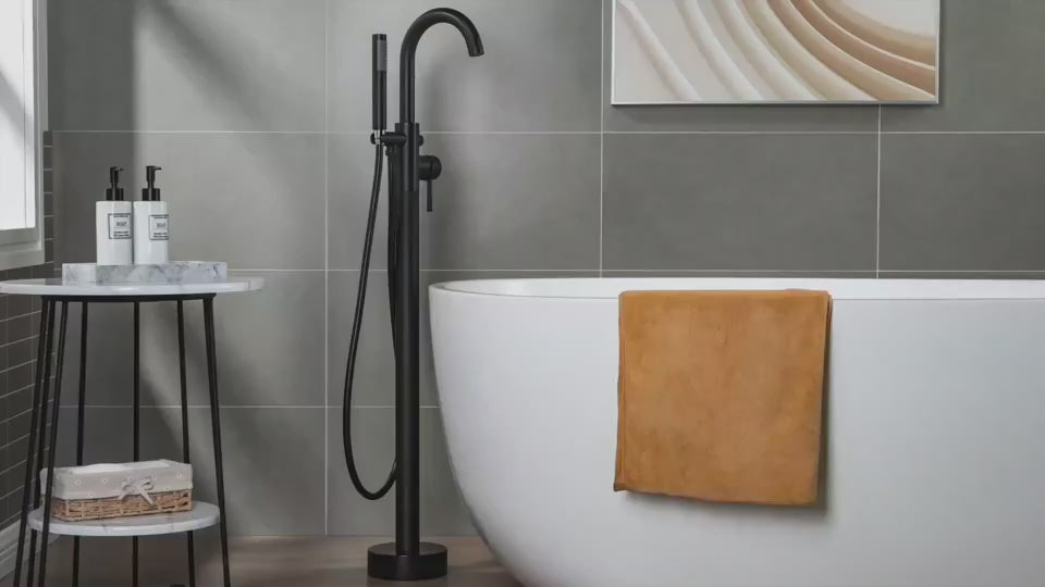 Load video: WOODBRIDGE Contemporary Single Handle Floor Mount Freestanding Tub Filler Faucet with Cylinder Shape Hand shower