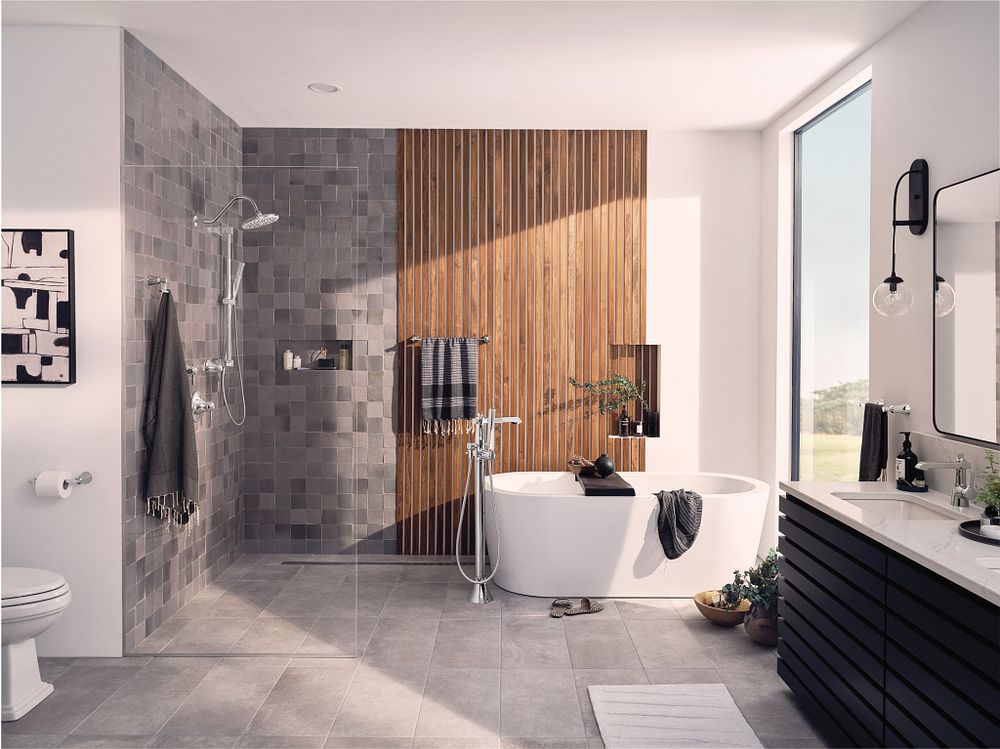 Flara one-handle tub filler includes hand shower