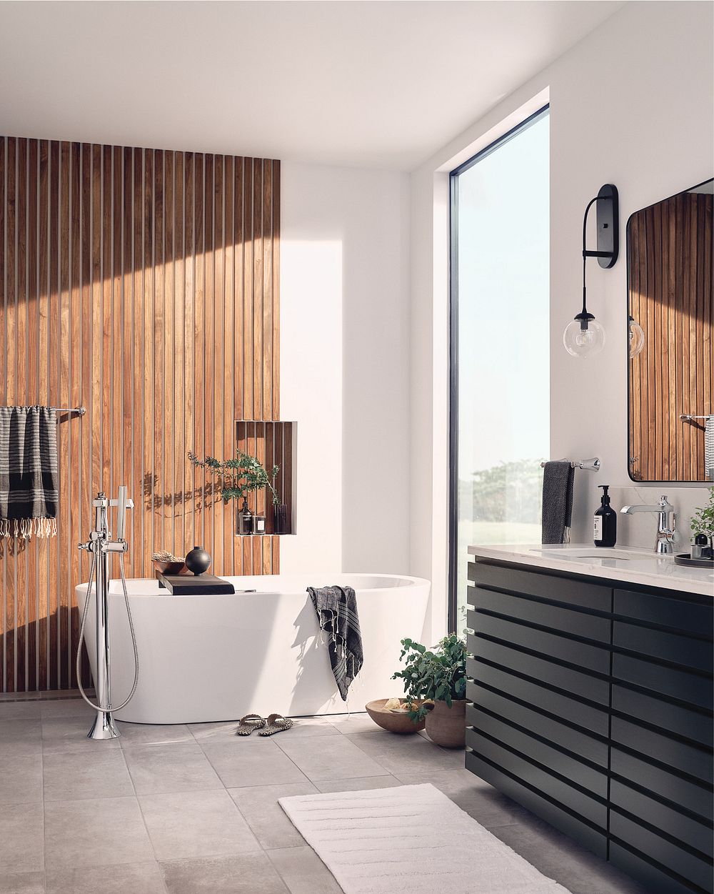 Flara one-handle tub filler includes hand shower