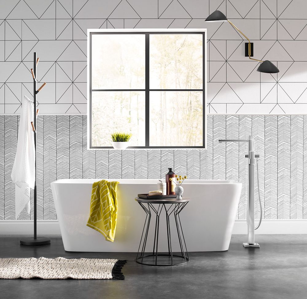 90 Degree one-handle tub filler includes hand shower