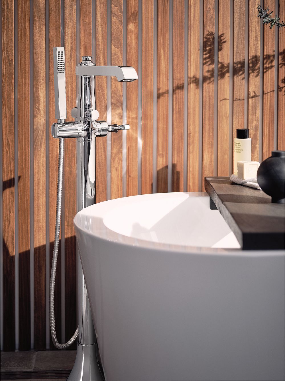Flara one-handle tub filler includes hand shower